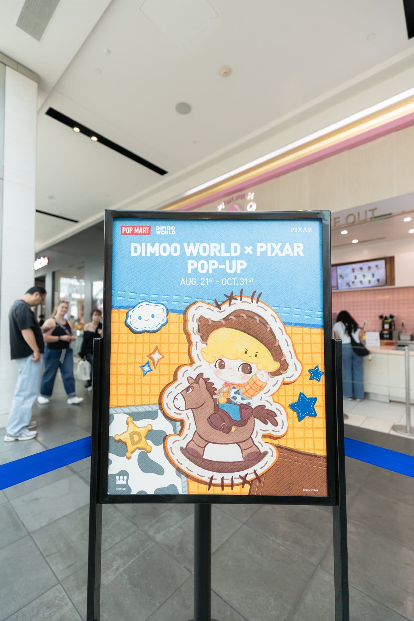 DIMOO WORLD x PIXAR Pop-Up sign, open August 21 to October 31 at the Pop Mart DIMOO WORLD x PIXAR pop-up at Westfield Valley Fair in Santa Clara by JY Studio