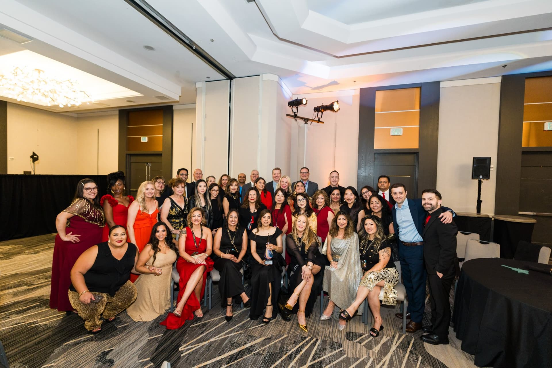 Large group photo of attendees in the reception room at Admin Awards 2026 at SFO Marriott Waterfront, Burlingame by JY Studio