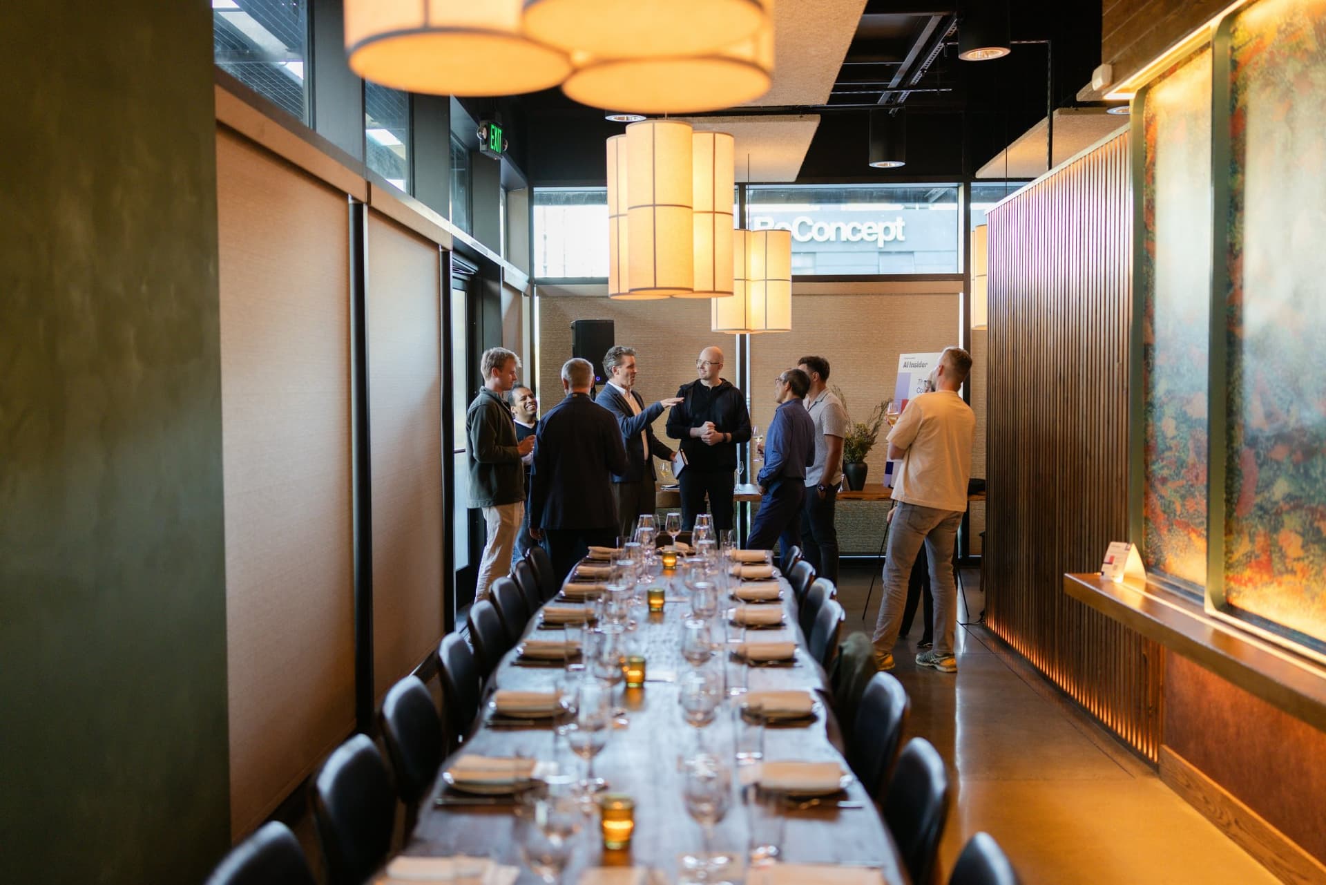 Guests gathering at the back of the room before dinner at the Business Insider AI Insider executive dinner The Great Coding Reset during SF Tech Week 2026 in San Francisco by JY Studio