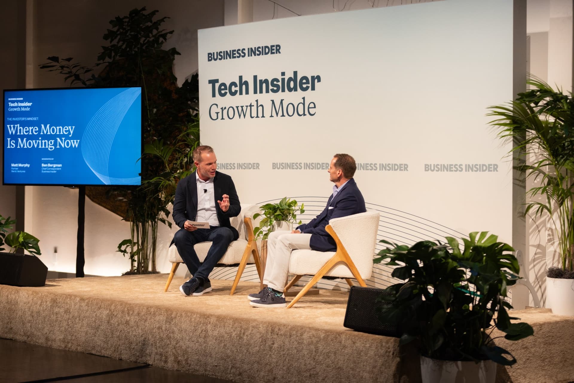 Ben Bergman and Matt Murphy seated on stage beside the Where Money Is Moving Now screen at Business Insider Tech Insider: Growth Mode at The Pearl SF during SF Tech Week 2026 in San Francisco by JY Studio