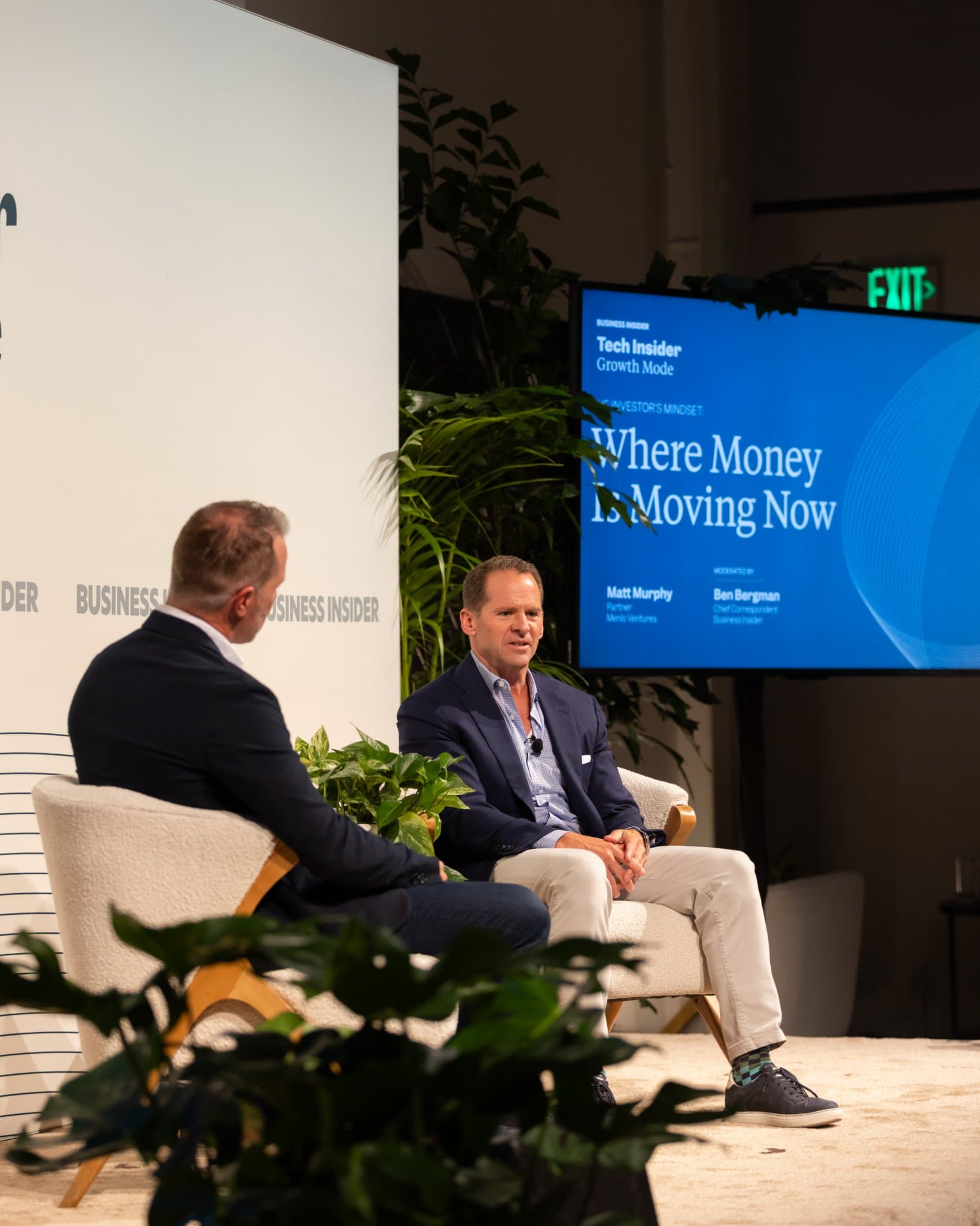 Matt Murphy speaking as Ben Bergman listens beside the session screen at Business Insider Tech Insider: Growth Mode at The Pearl SF during SF Tech Week 2026 in San Francisco by JY Studio