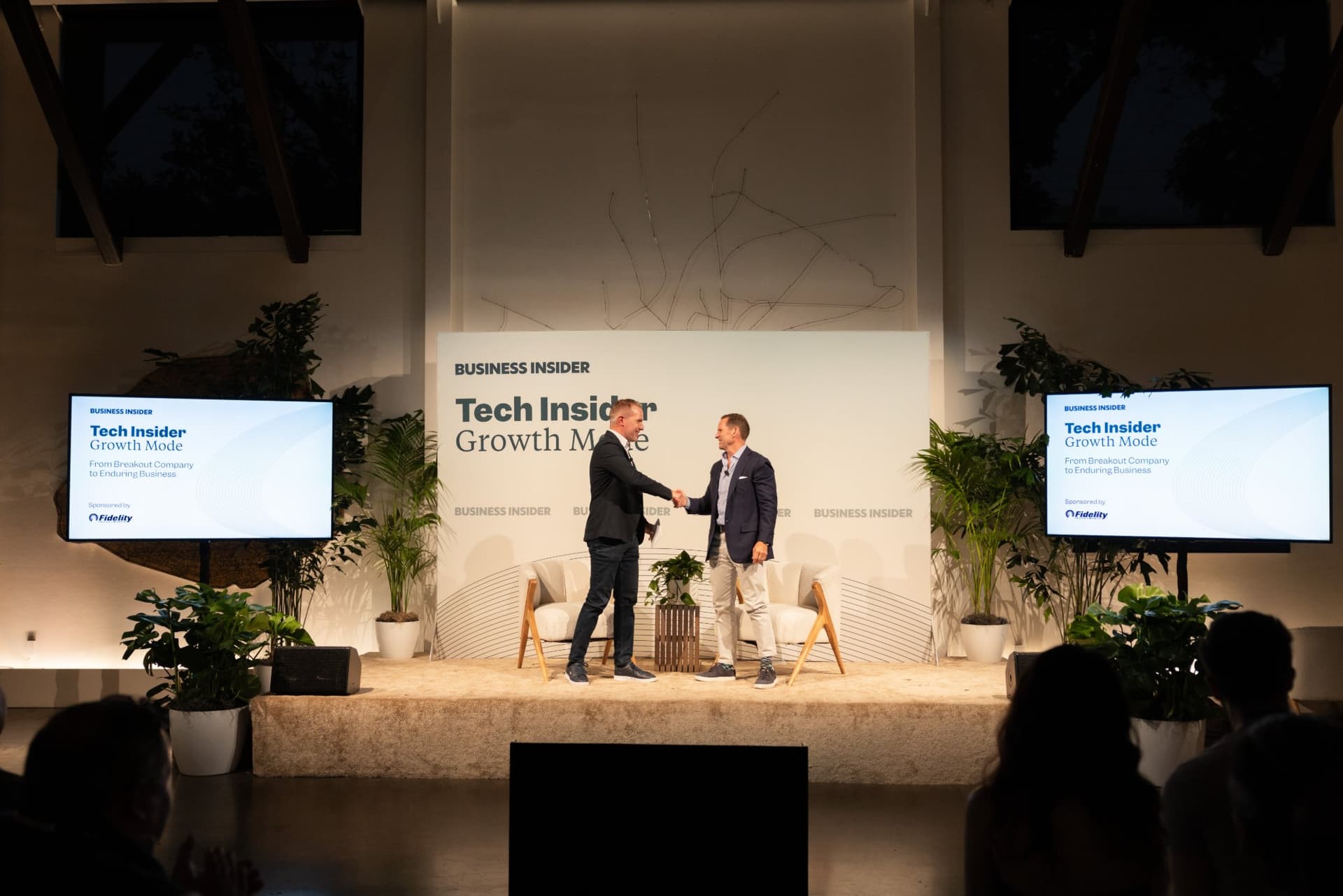 Lime CEO Wayne Ting shaking hands on stage before Lime's Road to the IPO at Business Insider Tech Insider: Growth Mode at The Pearl SF during SF Tech Week 2026 in San Francisco by JY Studio