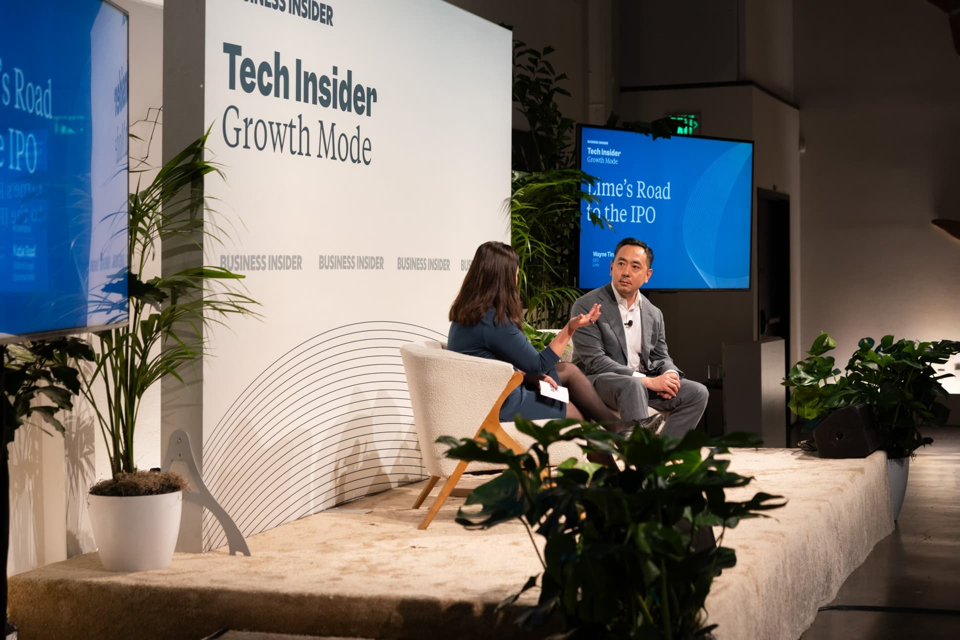Side view of Wayne Ting answering Katie Roof's question at Business Insider Tech Insider: Growth Mode at The Pearl SF during SF Tech Week 2026 in San Francisco by JY Studio