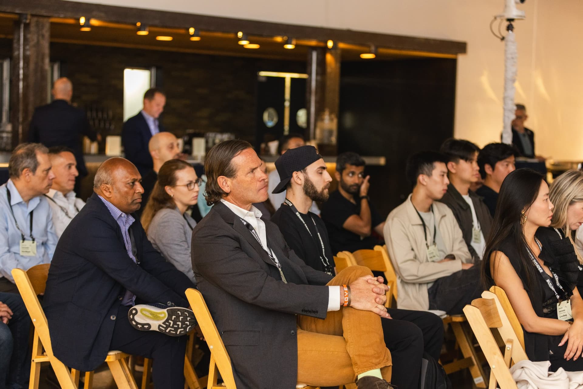 Attendees listening intently during the Lime fireside chat at Business Insider Tech Insider: Growth Mode at The Pearl SF during SF Tech Week 2026 in San Francisco by JY Studio