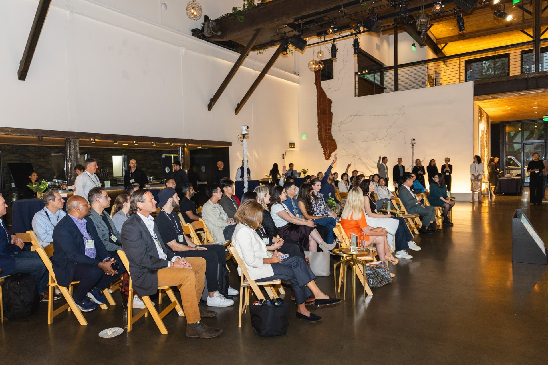 Full room of founders and investors with a hand raised at Business Insider Tech Insider: Growth Mode at The Pearl SF during SF Tech Week 2026 in San Francisco by JY Studio