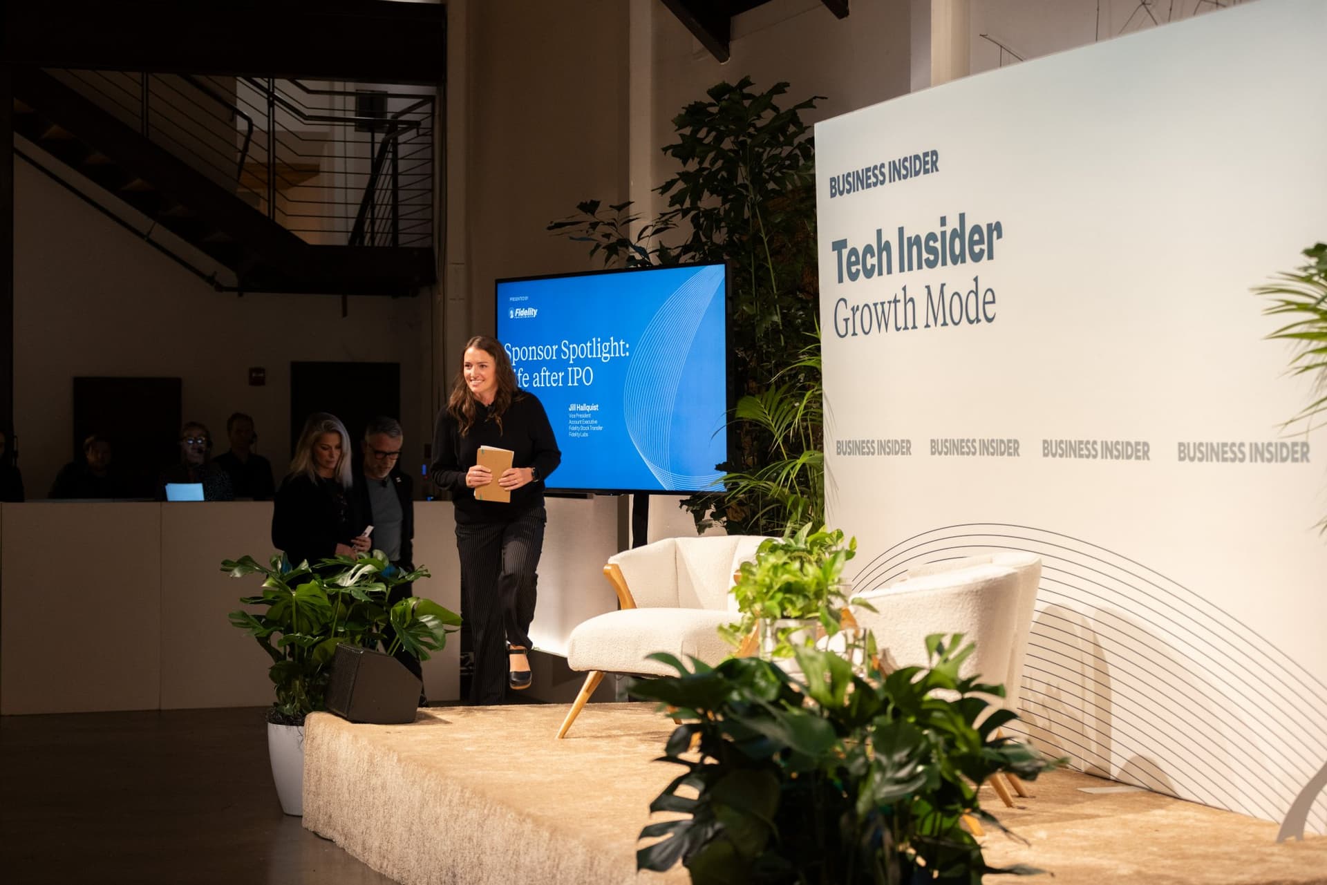 Business Insider host introducing the Sponsor Spotlight: Life after IPO at Business Insider Tech Insider: Growth Mode at The Pearl SF during SF Tech Week 2026 in San Francisco by JY Studio