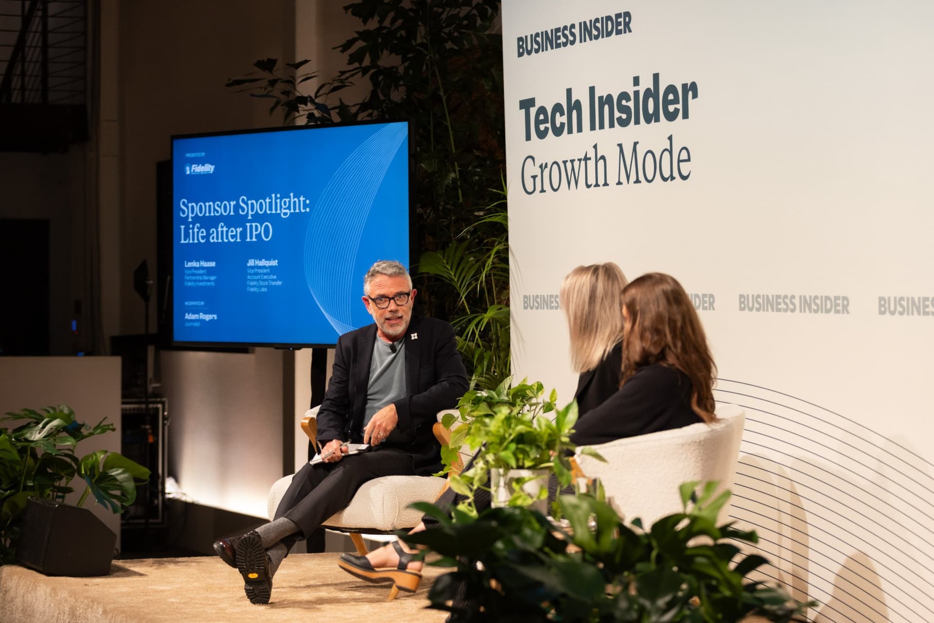 Journalist Adam Rogers moderating the Fidelity Sponsor Spotlight on life after IPO at Business Insider Tech Insider: Growth Mode at The Pearl SF during SF Tech Week 2026 in San Francisco by JY Studio