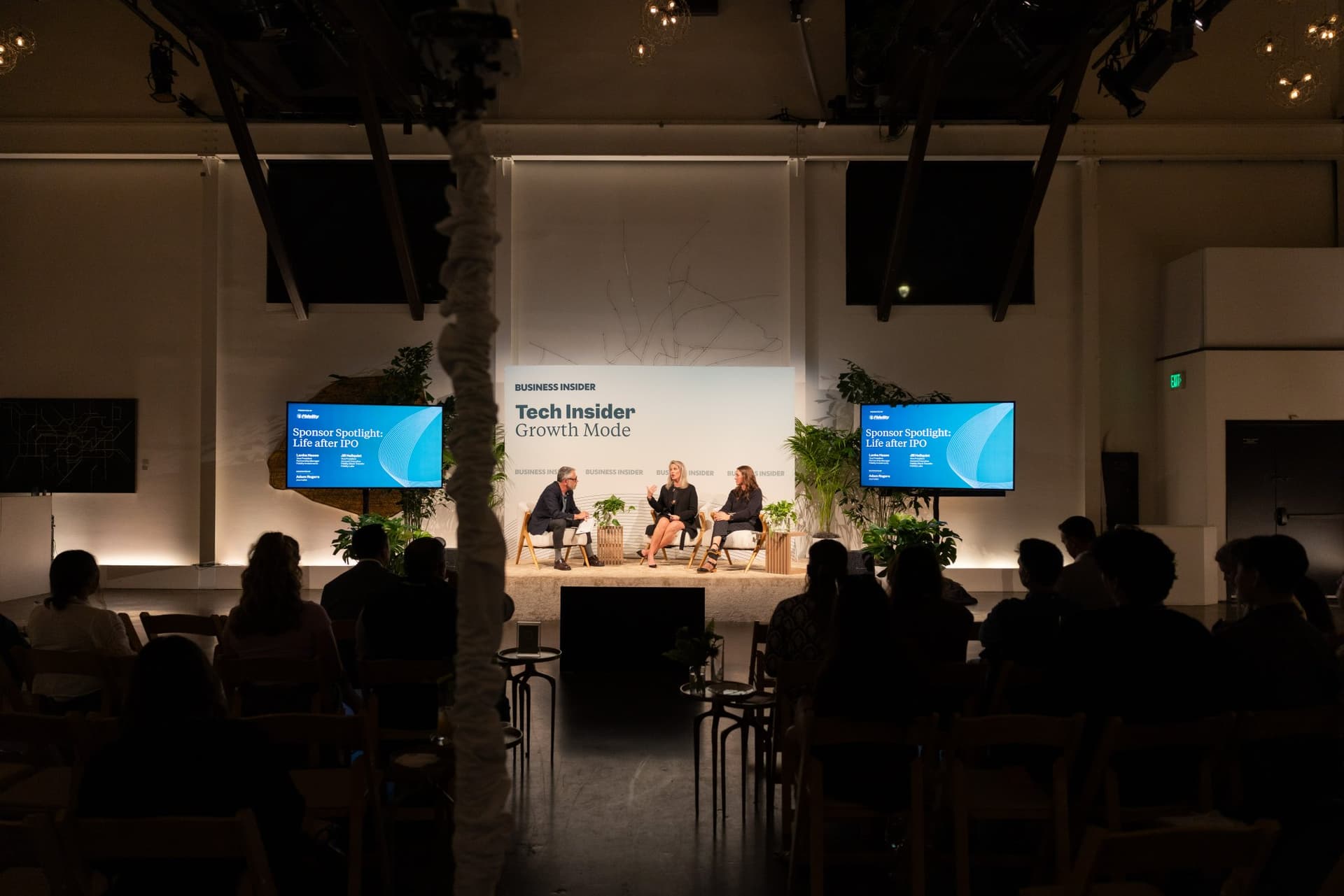 Darkened room facing the Life after IPO panel on stage at Business Insider Tech Insider: Growth Mode at The Pearl SF during SF Tech Week 2026 in San Francisco by JY Studio