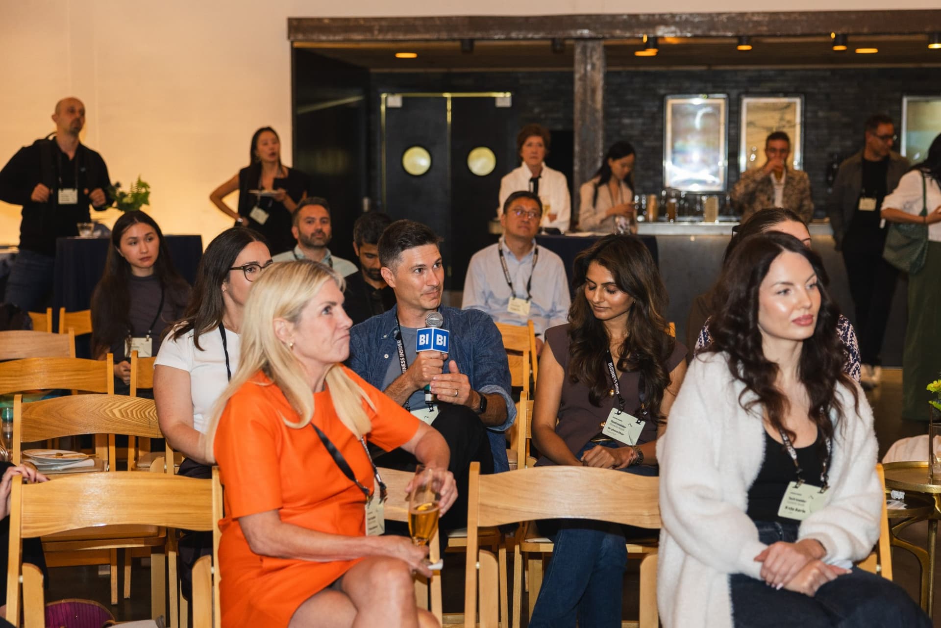 Attendees with badges listening from their seats at Business Insider Tech Insider: Growth Mode at The Pearl SF during SF Tech Week 2026 in San Francisco by JY Studio