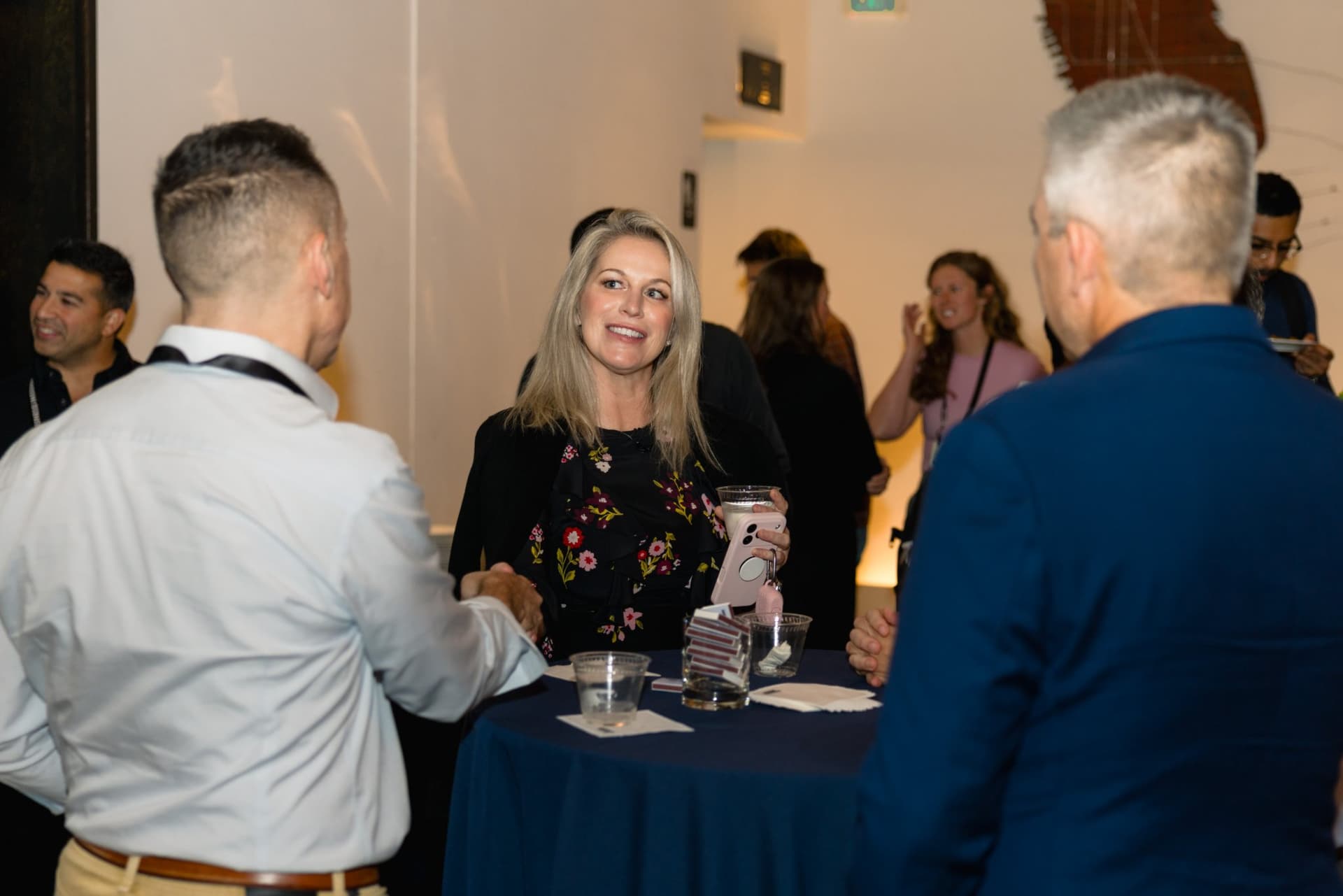 Guests talking around a cocktail table at Business Insider Tech Insider: Growth Mode at The Pearl SF during SF Tech Week 2026 in San Francisco by JY Studio