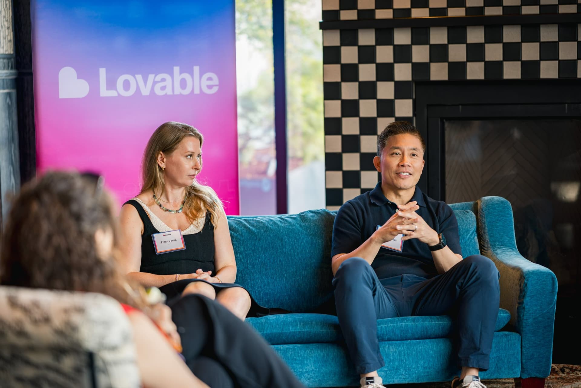 Herman Man, Chief Product Officer at Ironclad, listening alongside Elena Verna on stage at Lovable's When Everyone Can Build panel in San Francisco by JY Studio