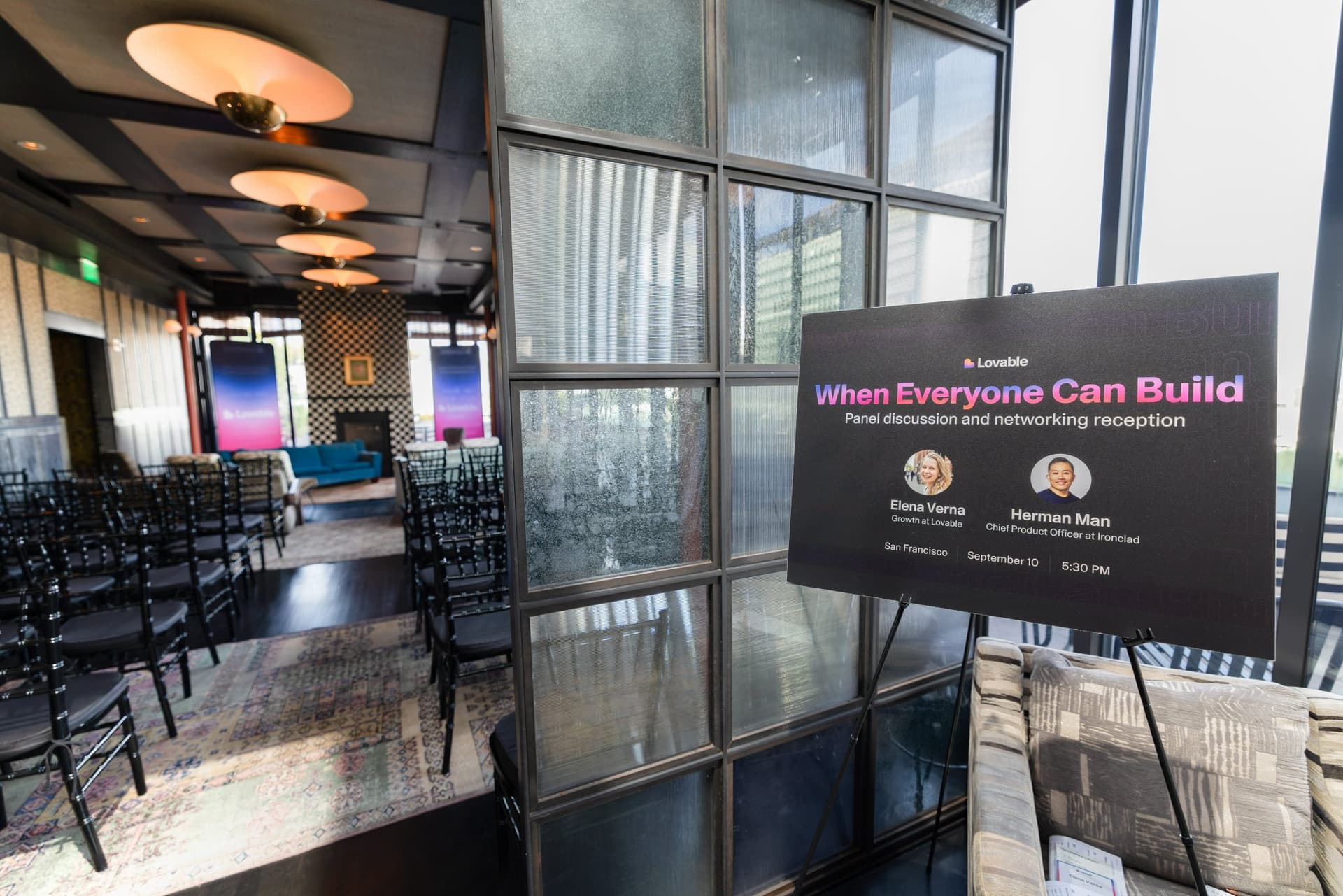 When Everyone Can Build event sign on an easel by the seating area at Lovable's When Everyone Can Build panel in San Francisco by JY Studio