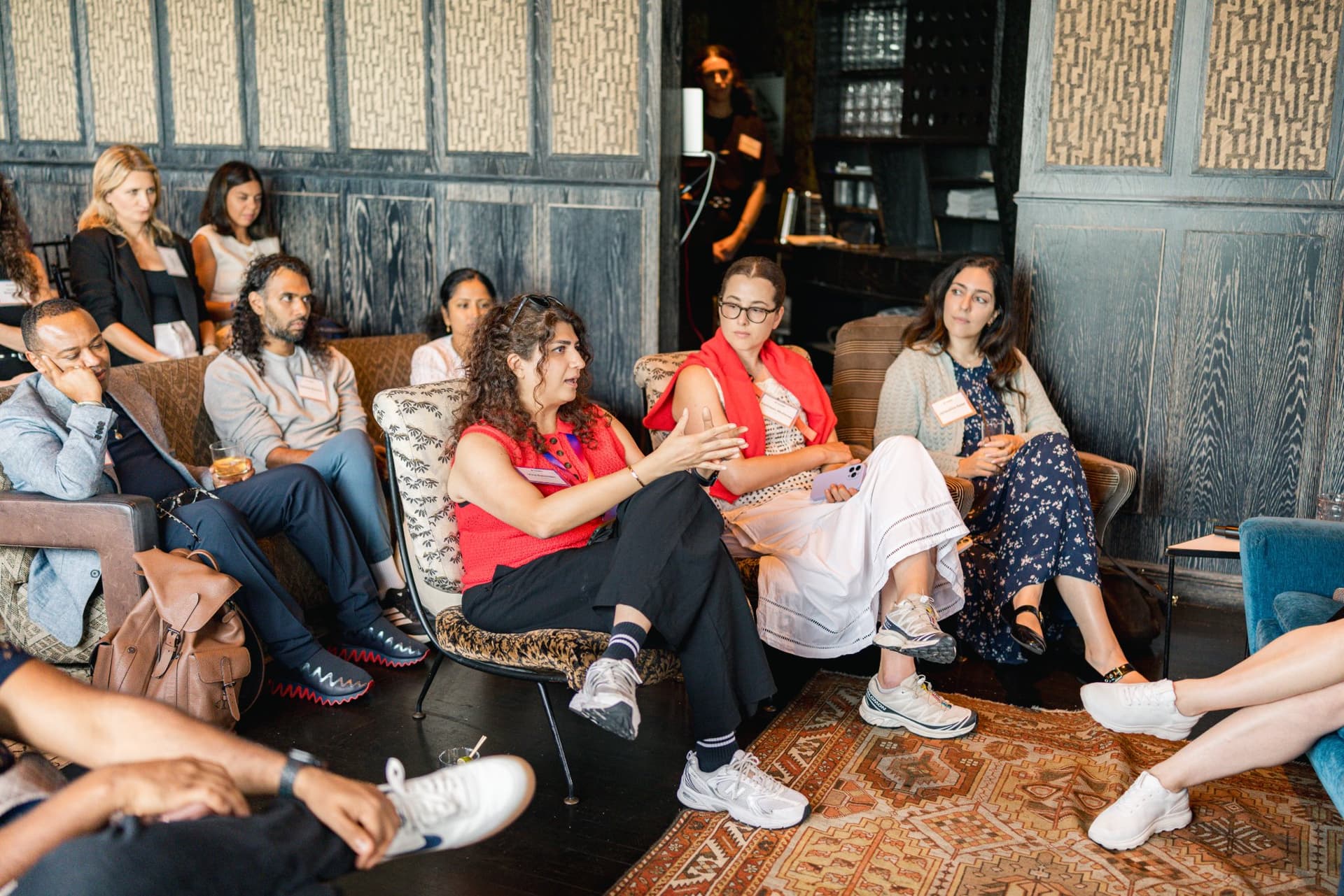 Audience members in lounge seating listening to the panel at Lovable's When Everyone Can Build panel in San Francisco by JY Studio