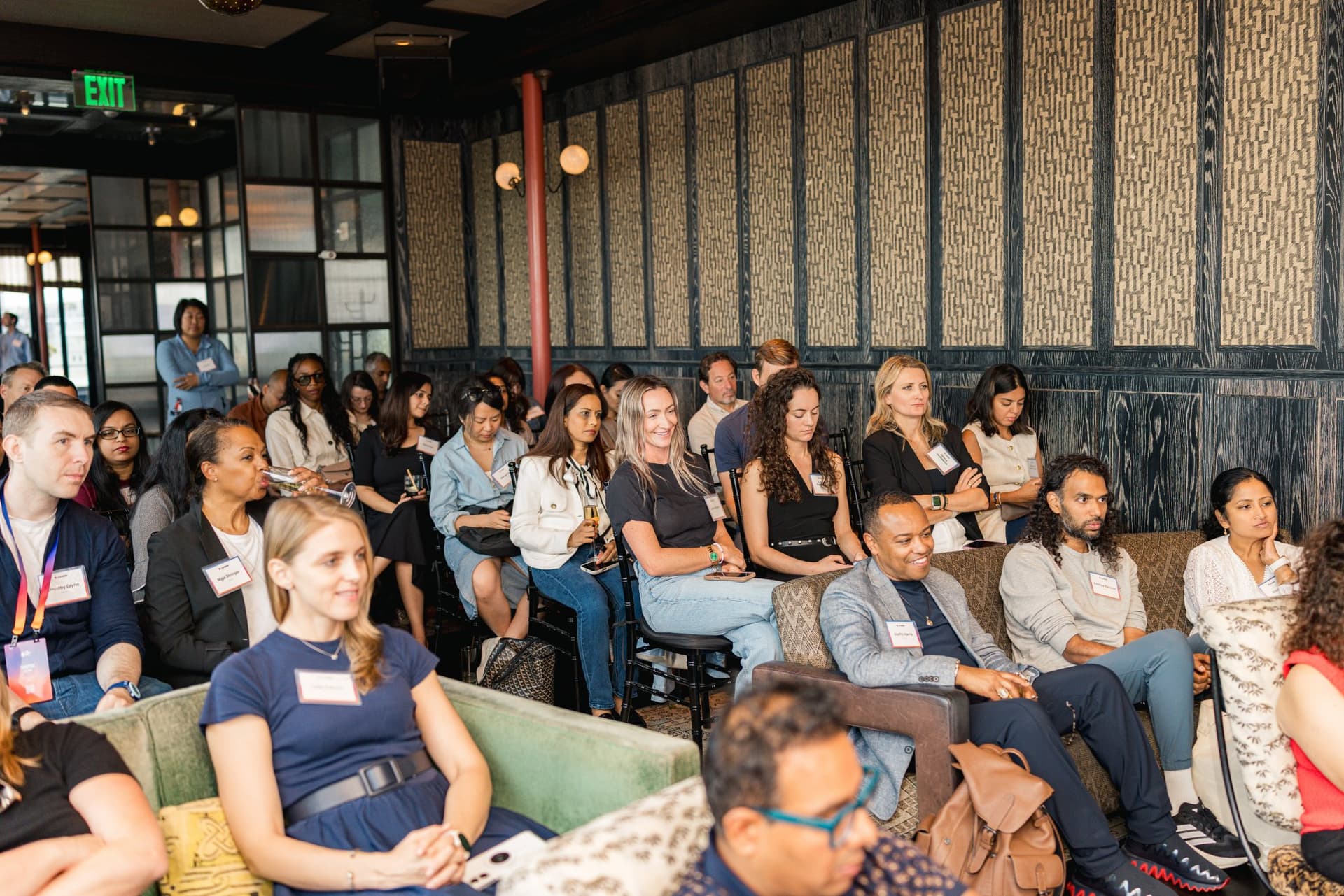 Wide view of the full audience listening to the panel at Lovable's When Everyone Can Build panel in San Francisco by JY Studio
