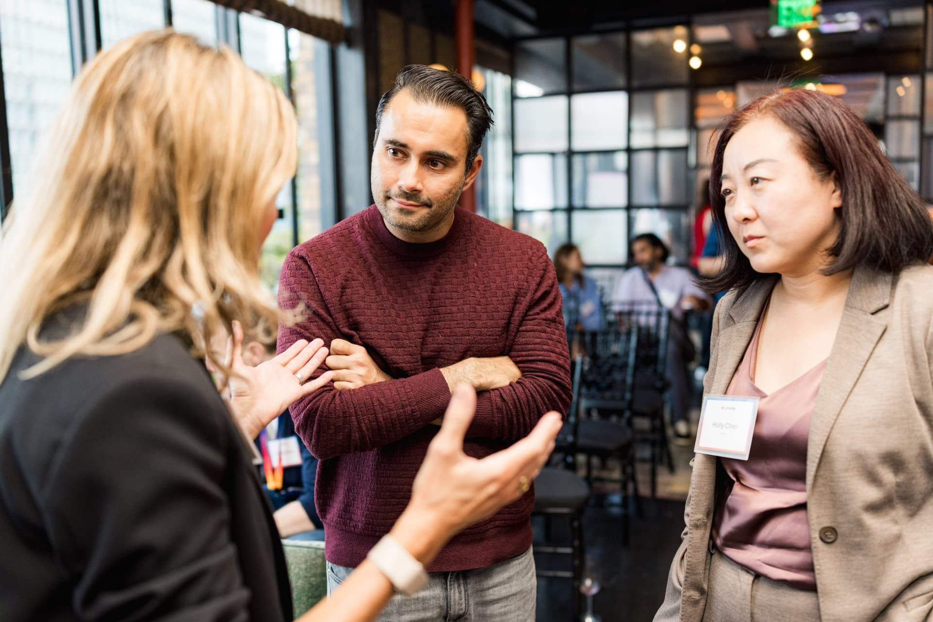 Three guests in a lively discussion after the panel at Lovable's When Everyone Can Build panel in San Francisco by JY Studio