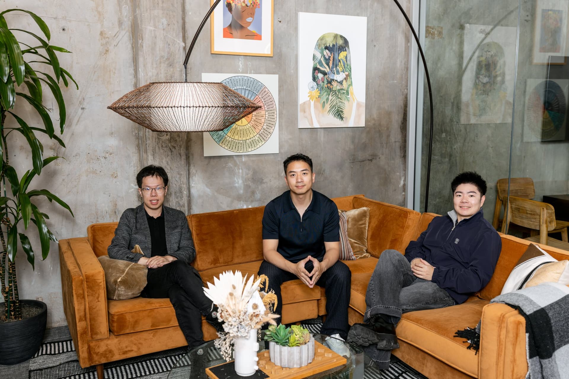 Abaka AI founding team environmental portrait seated on an orange velvet sofa in a Mountain View Silicon Valley office, executive founder headshot session for company website and press by JY Studio