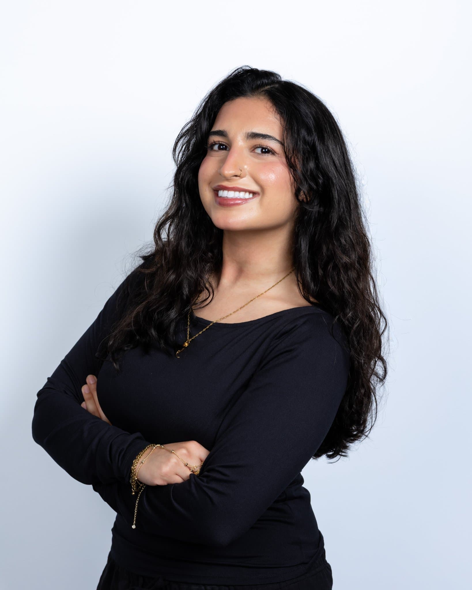 Abaka AI team member professional headshot with crossed arms on a clean white backdrop, shot on-site in Mountain View Silicon Valley for LinkedIn and company website by JY Studio