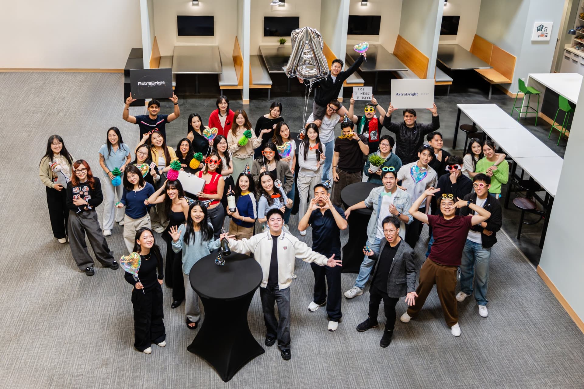 Abaka AI full company team group photo shot from above in an open office in Mountain View Silicon Valley, celebratory on-site team photography for About page and LinkedIn by JY Studio