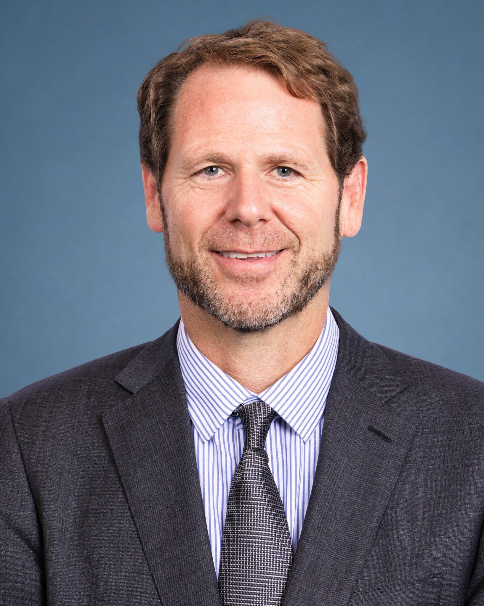 Act Laws lawyer corporate headshot session on-site in San Francisco for law firm branding and attorney bio page by JY Studio